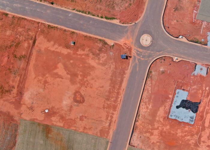 Aerial top view residential development the foundation of a new homes in construction site